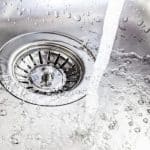 Water flowing down clean drain.